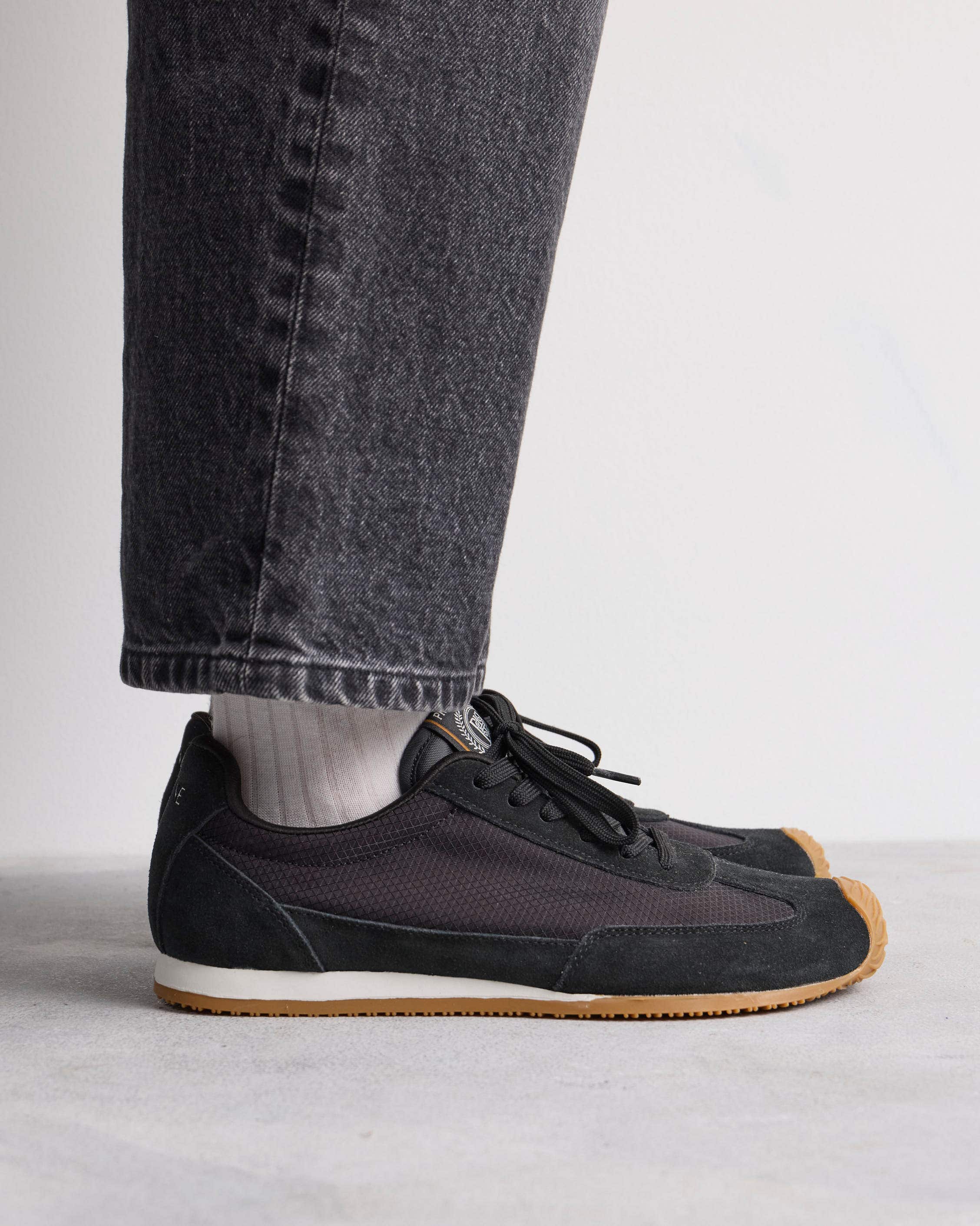 Sneaker Row en cuero y textil