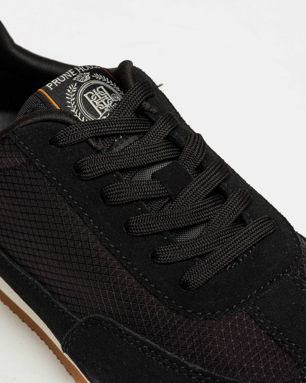 Sneaker Row en cuero y textil