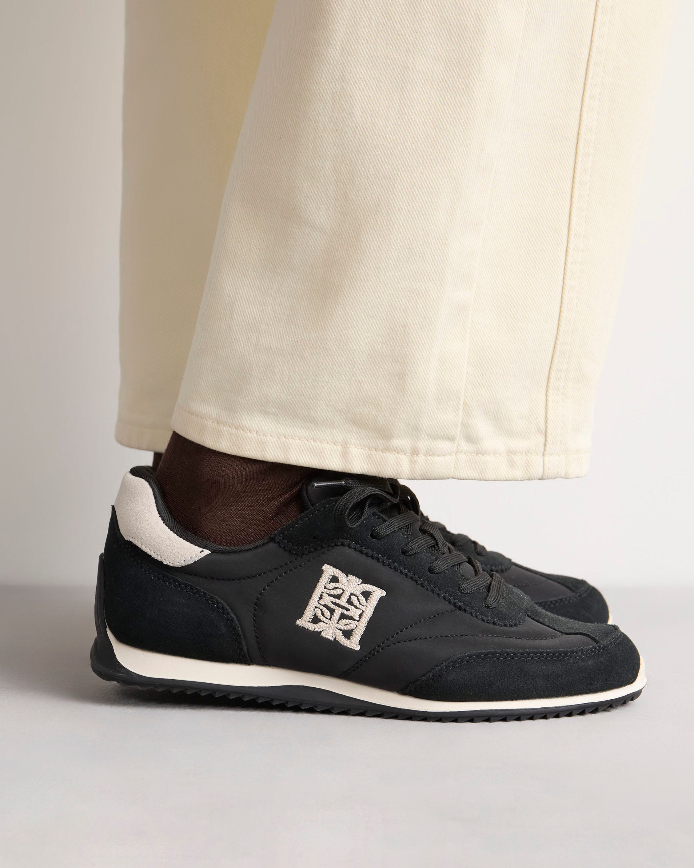 Sneaker Olimpia en cuero y textil