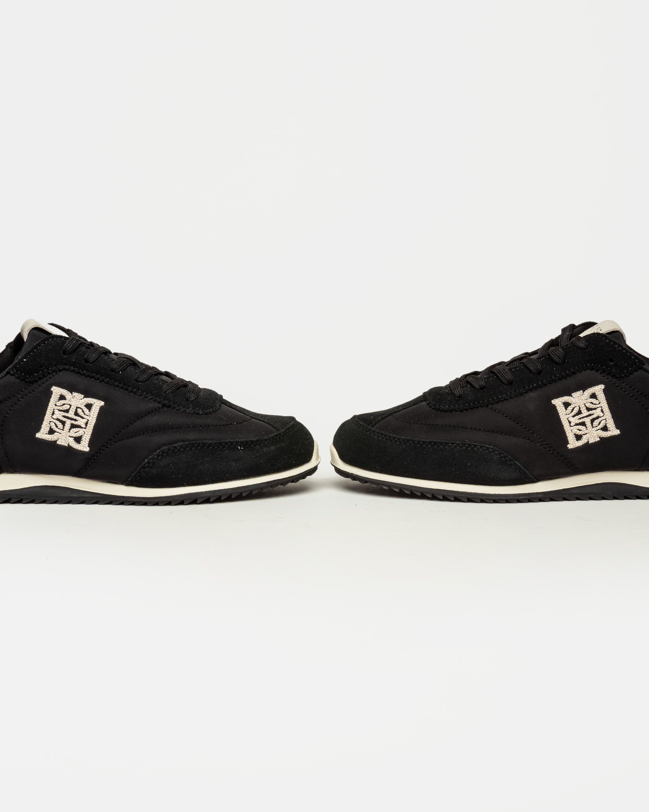 Sneaker Olimpia en cuero y textil