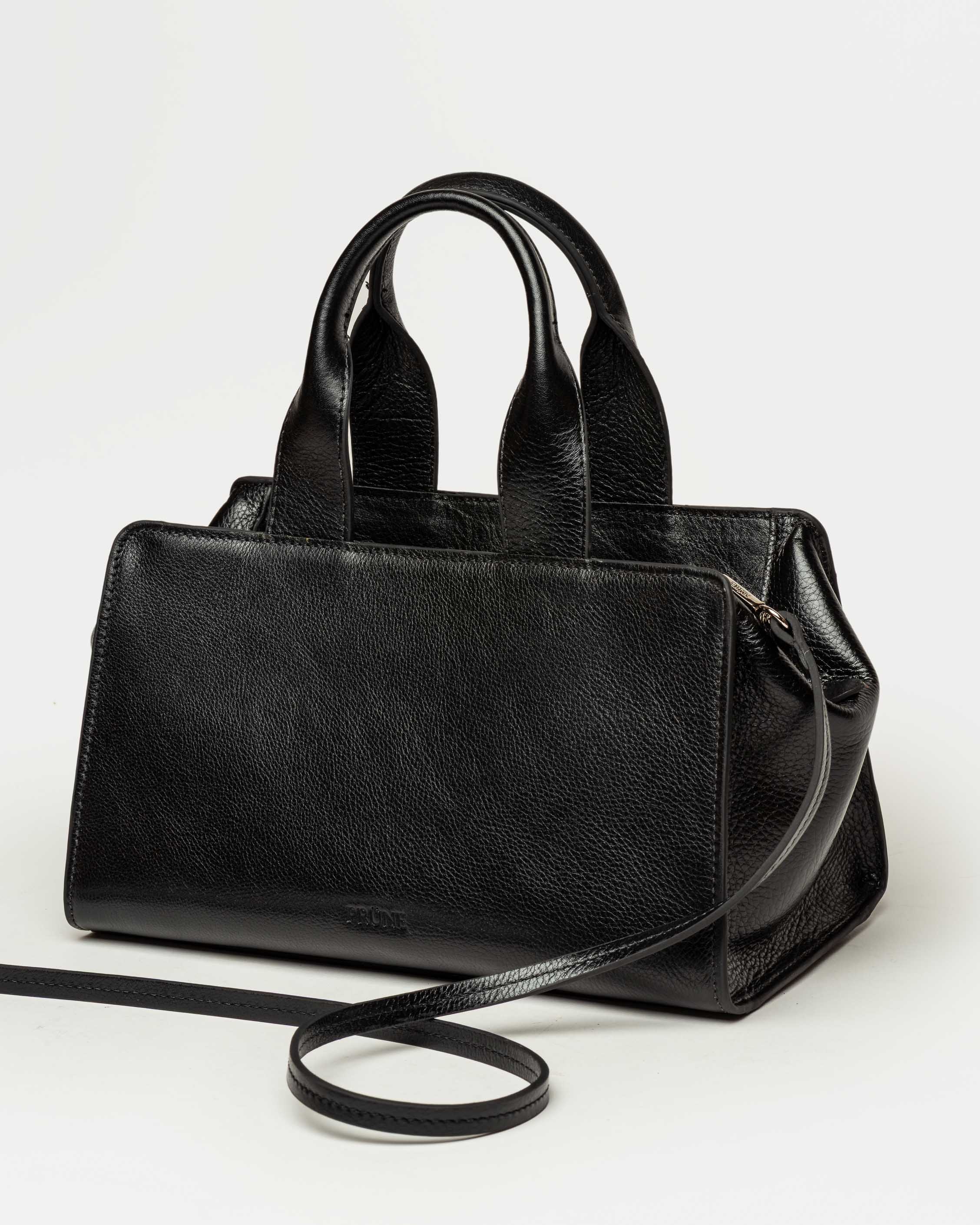 Cartera de mano Mila en cuero liso